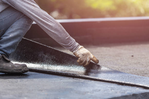 Professional Waterproofing technician working in West Newton, IN